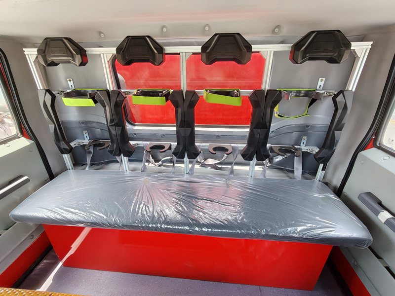 Fire fighting truck with SCBA seats